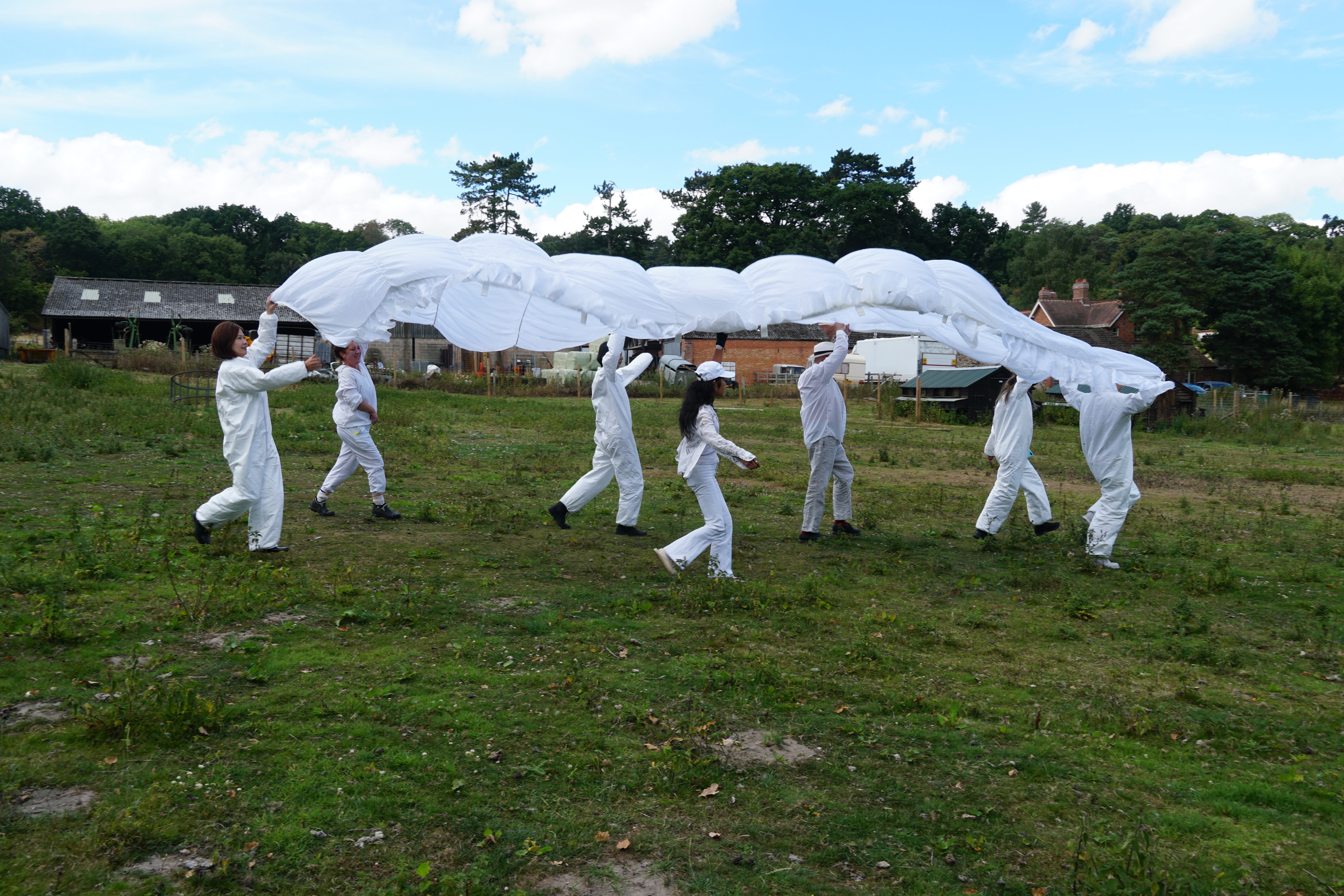 With artists Miffy Ryan & The Lone Ones Collective - using a large parachute and white clothes to guide the students to interact with the environment